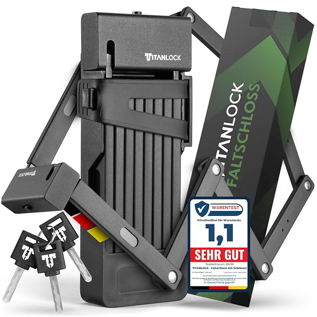 Candado plegable TITANLOCK desplegado en toda su longitud junto a su soporte al cuadro